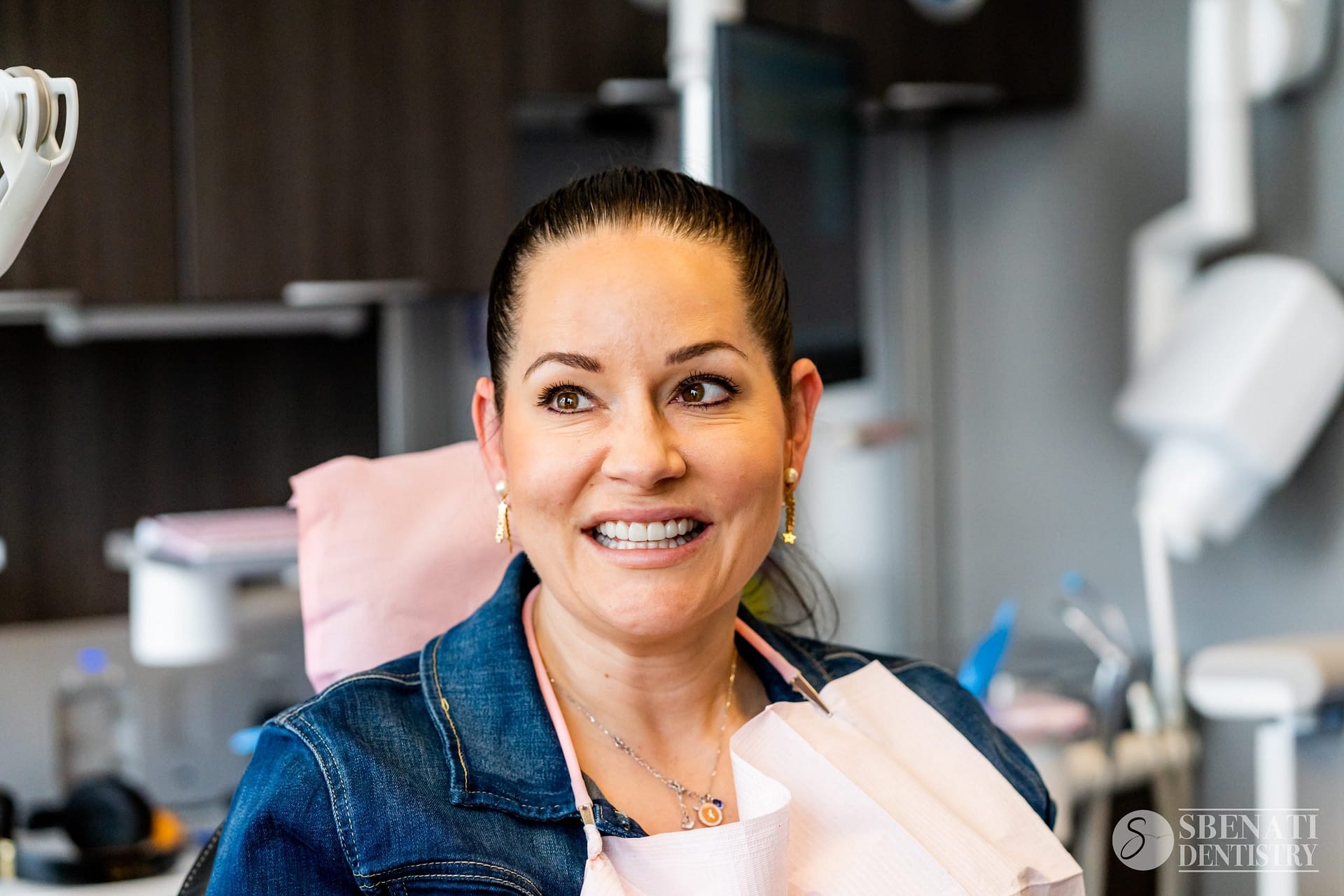 A happy and satisfied patient of london ontario dentist Sbenati Dentistry