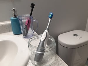Keep toothbrushes distanced